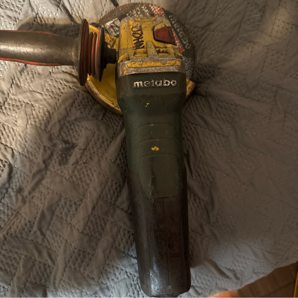Metabo Angle Grinder with Yellow and Black Design